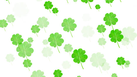 digital animation of multiple clover leaves floating against white background