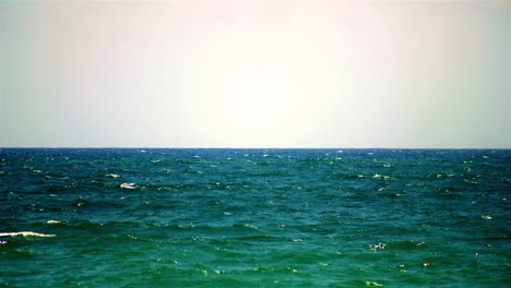 Ocean-horizon-clear-sky-green-blue-water