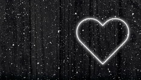 animation of white neon heart flashing in dark forest with falling snow
