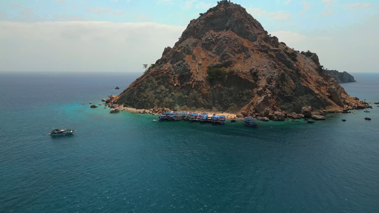 Stunning aerial footage captured by drone showcasing the crystal-clear turquoise waters and white sand beaches of Suluada Island - 4K Cinematic Drone Footage - Suluada - Turkey_07