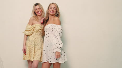 two women in summer dresses