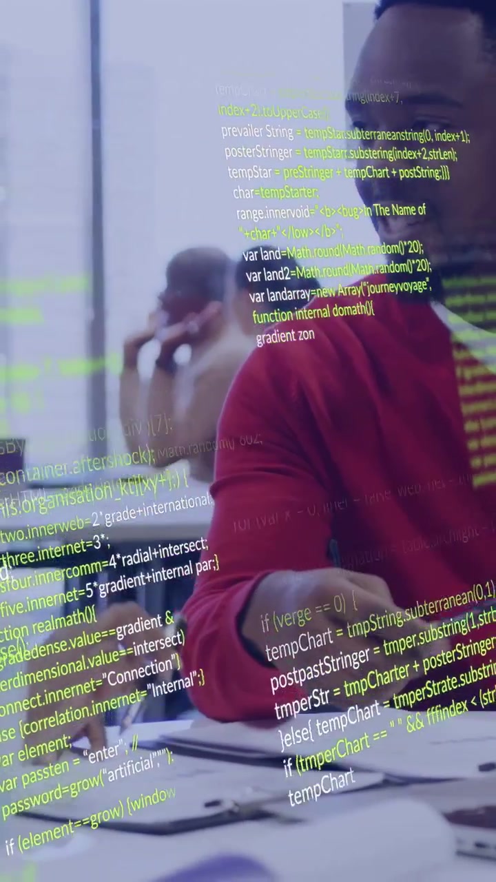 Vertical video: Man in red top handing pen, pointing at docs for tech code review, overlay rising
