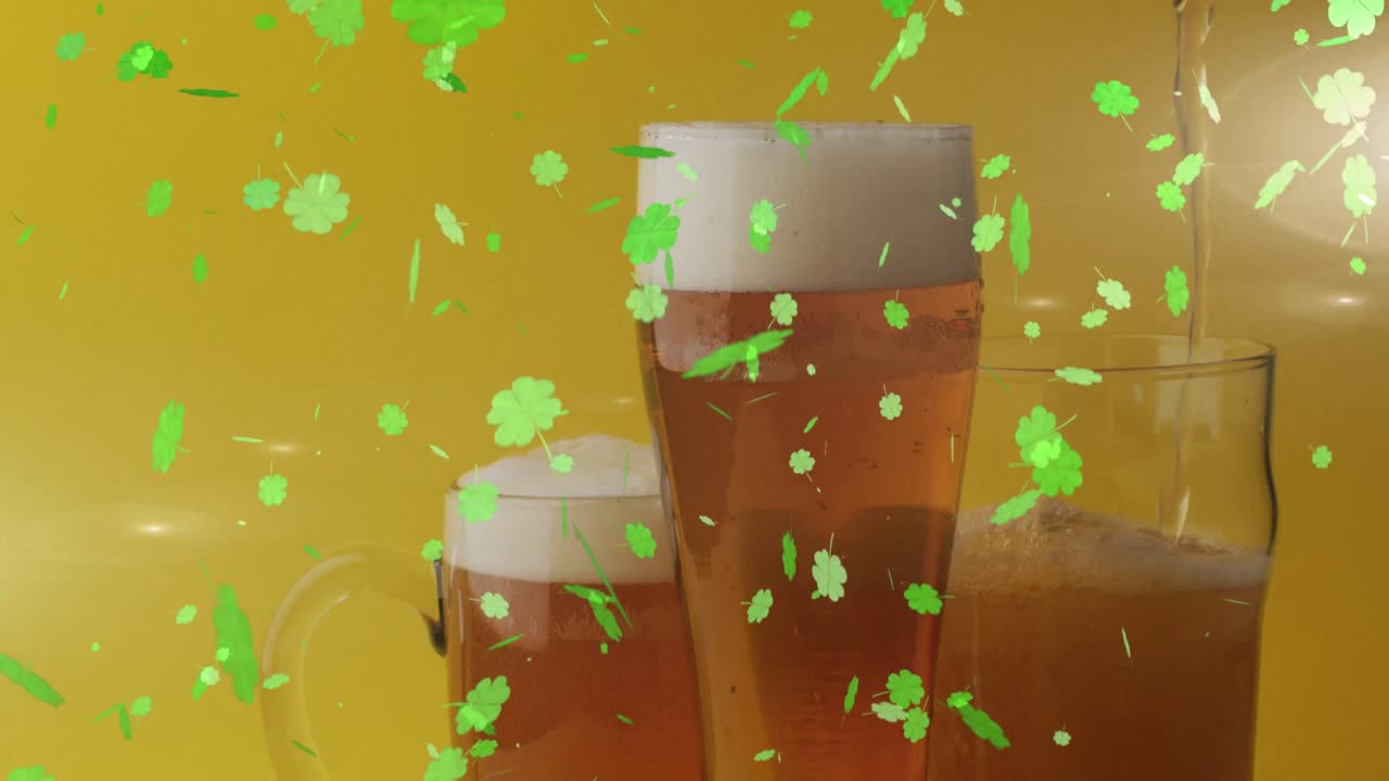 Animation of st patrick's day green shamrock falling over beer glasses