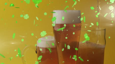 animation of st patrick's day green shamrock falling over beer glasses