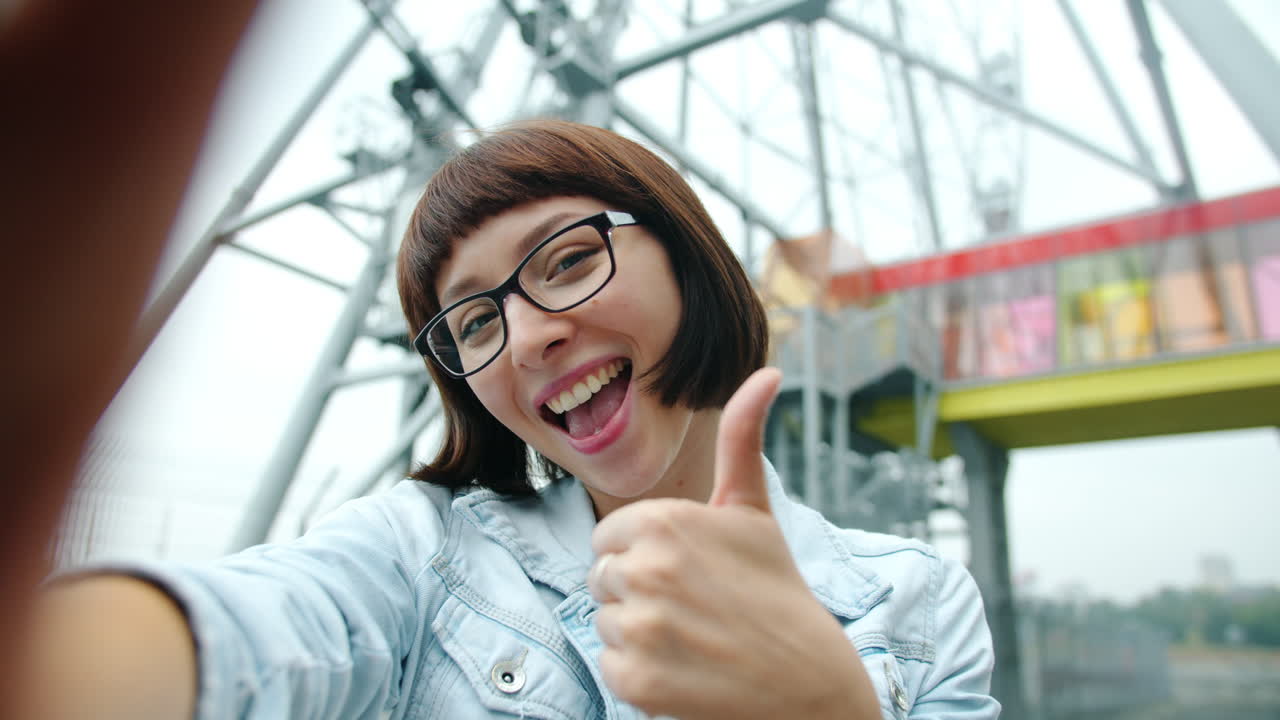 Happy Woman Taking Selfie Near Ferris Wheel