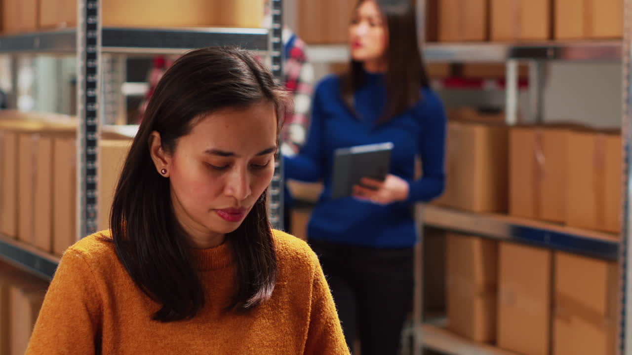 Warehouse Employees Working with Inventory