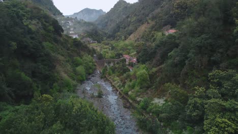 Drone-view-of-landscape-and-river-in-Madeira,-Portugal
