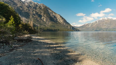 TIMELAPSE-Clouds-casting-shadows-on-beautiful-lake-and-mountains-in-Argentinian-Patagonia