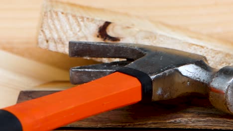 Side shot of different pieces of wood and a hammer