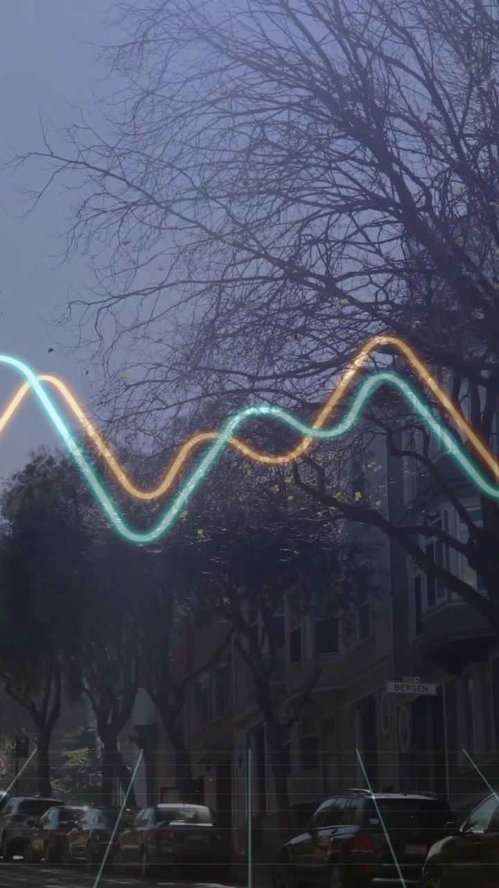 Vertical video: Street tree in transit, neon waves appearing from left, weaving, revealing trolley