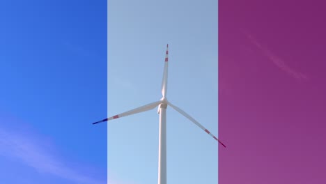 windmill against the background of the france flag