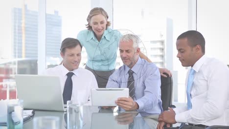 business people looking at plans