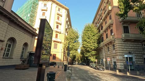 sunny day on a cobblestone street in naples