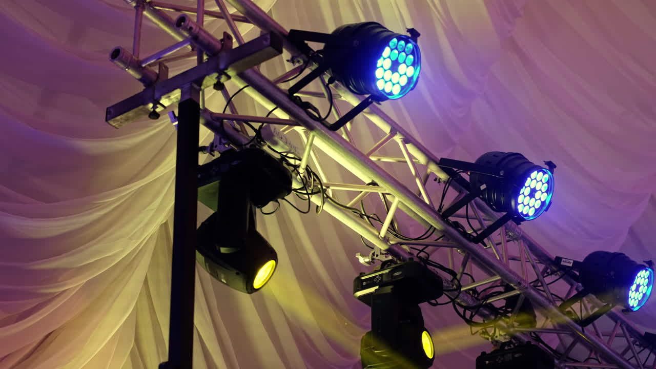 Stage lights at wedding. Fog in the air