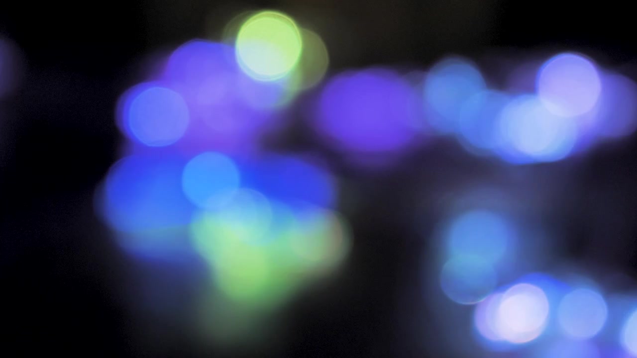 Sfondo con luci di Natale sfocate e fuori fuoco.