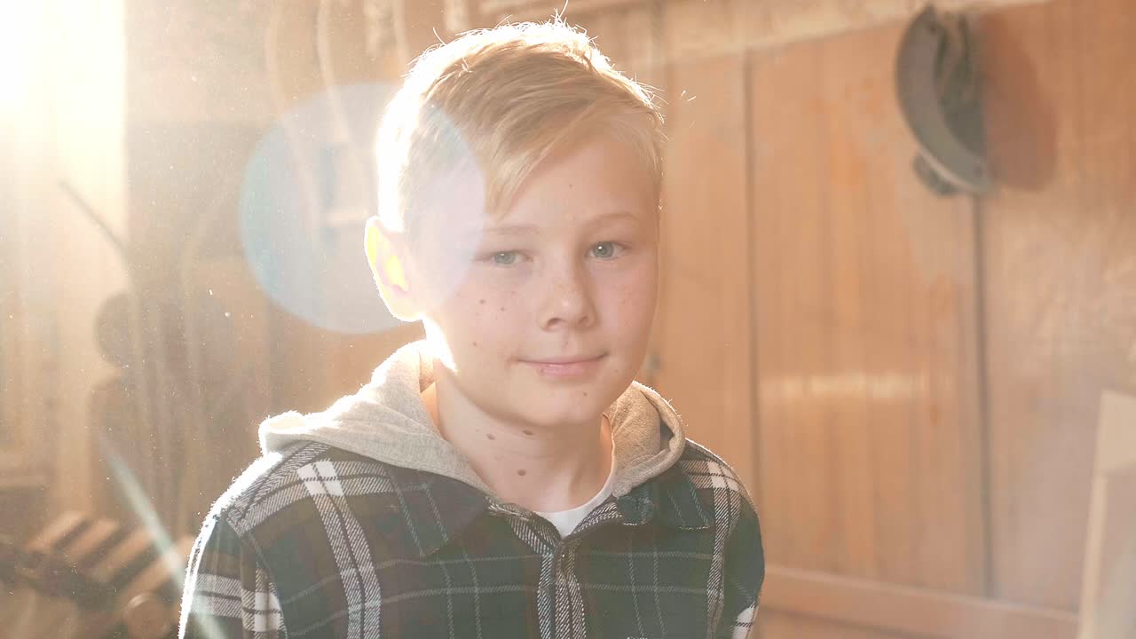 Young boy in a woodworking workshop