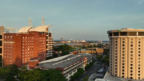 Aerial-view-of-industrial-canal-and-downtown-Mobile,-Alabama