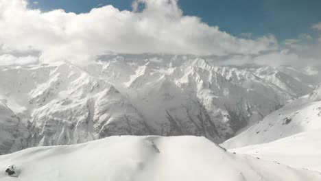 drone shot of the mountains full of snow in the austrian alps - sölden, austria