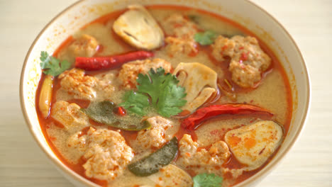 spicy boiled pork soup with mushroom - tom yum - asian food style