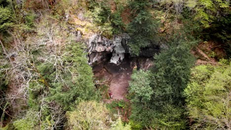 drone video revealing sacred cave of saint dionysios of olympus mountain forest greece