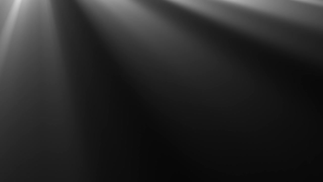 Abstract Light Rays Moving Down on Black Background