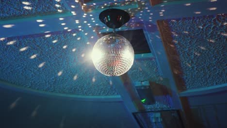 disco ball spinning shiny light roof