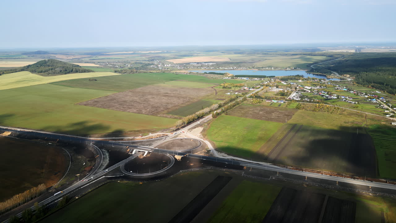 Aerial View of Highway Interchange Construction in Rural Area
