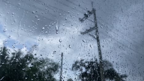 Storm-brings-rain-in-Bangladesh-as-seen-from-a-glass-window