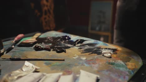 artist at work in a painting studio
