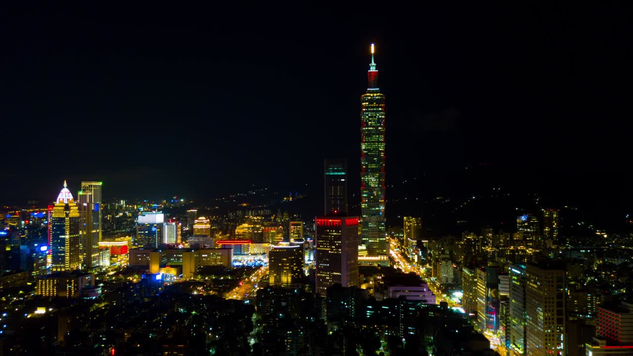 la noche iluminada paisaje de la ciudad de taipei famosa torre panorama aéreo 4k timelapse taiwán