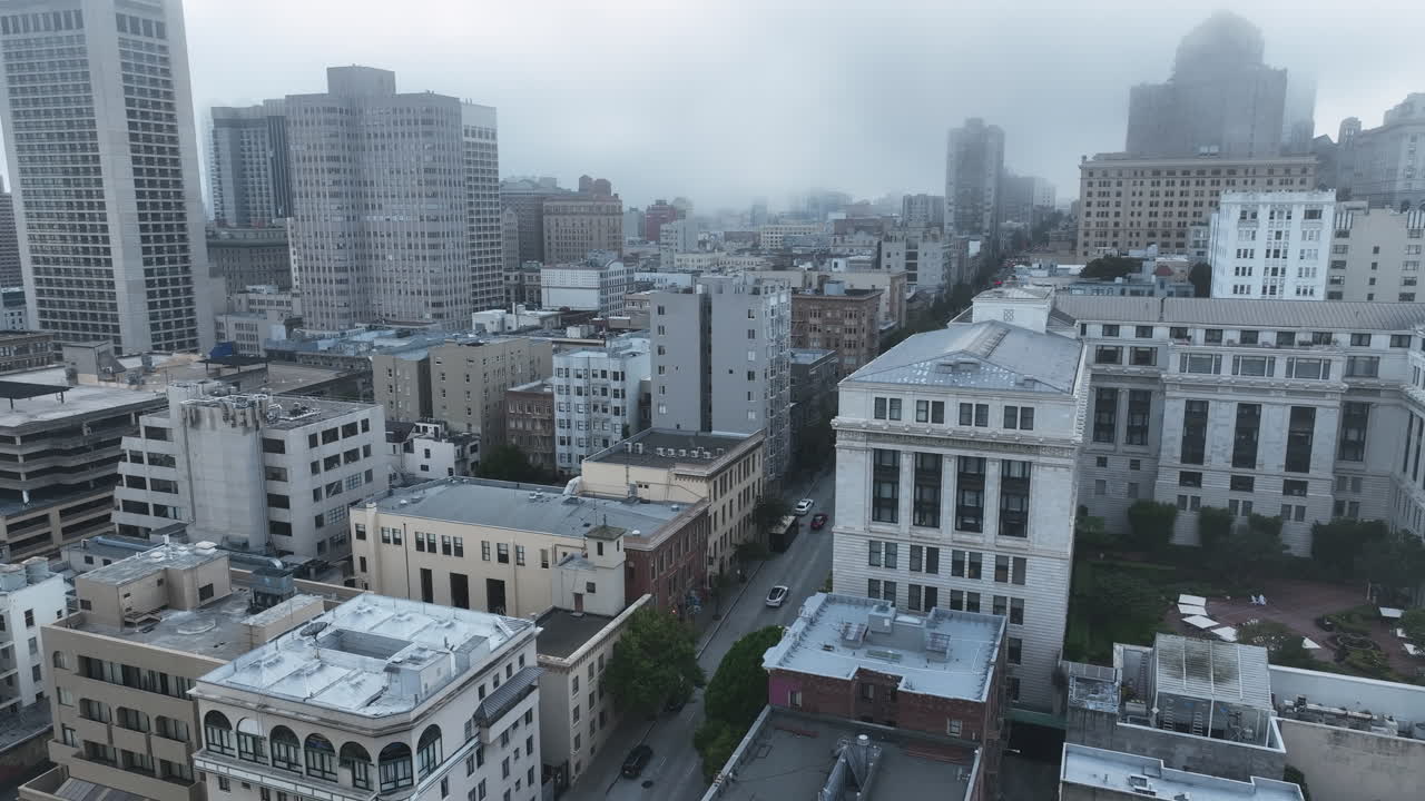 San Francisco City Shrouded By Fog In Califronia, USA. - aerial descend shot