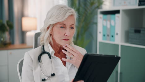 doctor using tablet in office