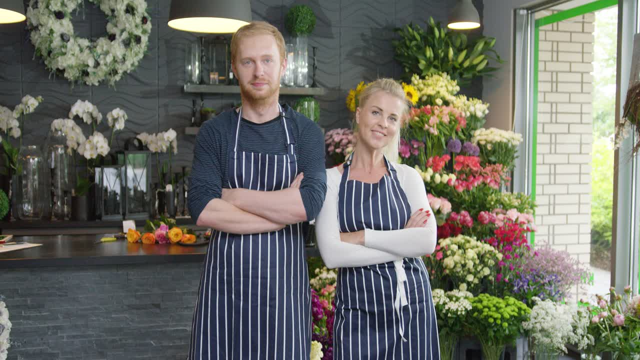 Cheerful people posing in shop