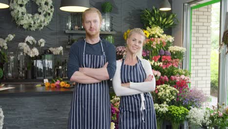 cheerful people posing in shop