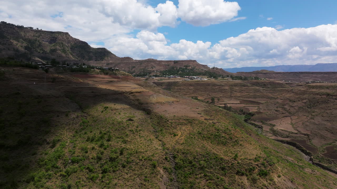 Dramatic Rugged Mountain Surroundings Over Lalibela Town In Northern Ethiopia. Aerial Drone Shot