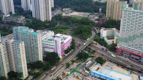 edificios de gran altura en el paisaje de la ciudad de kowloon, hong kong, toma aérea