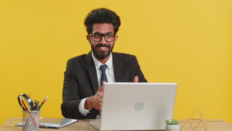 Excited-amazed-indian-businessman-touching-head-showing-explosion-looking-worried-shocked-brainstorm