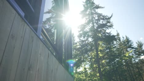 zoobox chalet revealed sunflare during beautiful sunrise at le vertendre in eastman, quebec canada