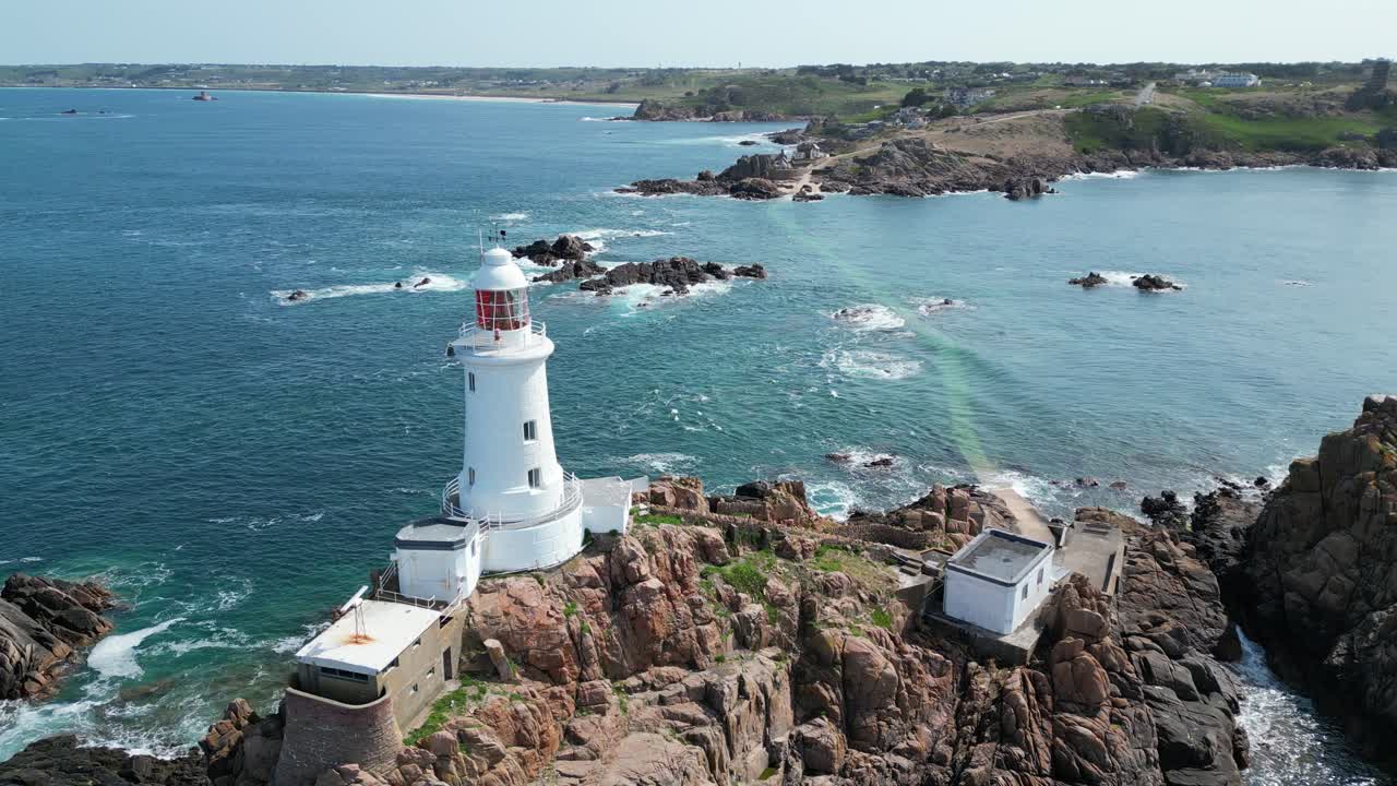 Lighthouse panning drone aerial La Corbi&egrave;re, Jersey