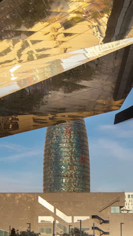 timelapse of the encants second hand market in barcelona and skyline behind in vertical