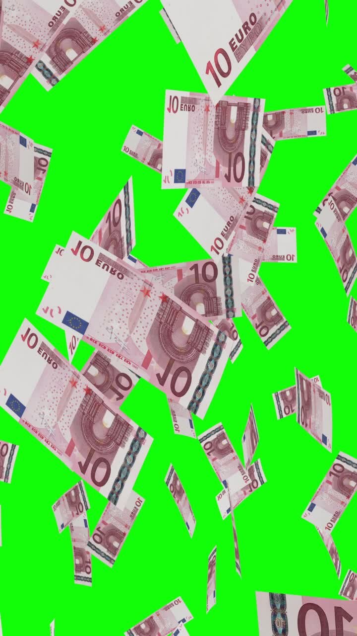 billetes de euro que caen en la pantalla verde
