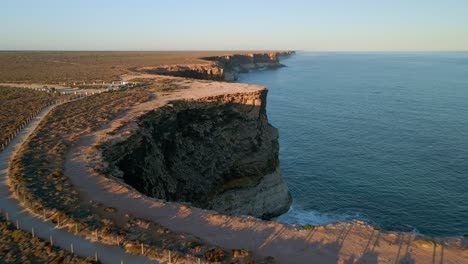 backward aerial shot of nullarbor cliffs, one of the longest sea cliffs in the world in south australia