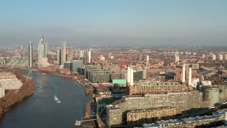 aerial shot towards battersea power station and vauxhall skyscrapers