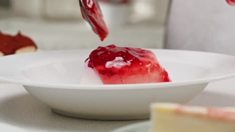 Chef preparing strawberry panna cotta