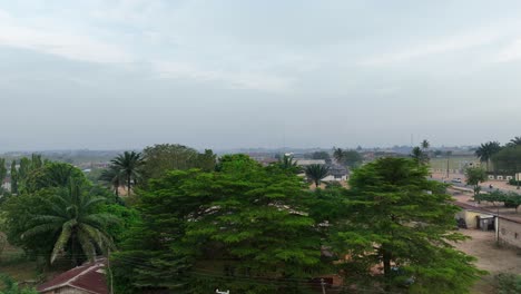 Aerial---Rising-wide-shot-over-a-restive-west-African-town