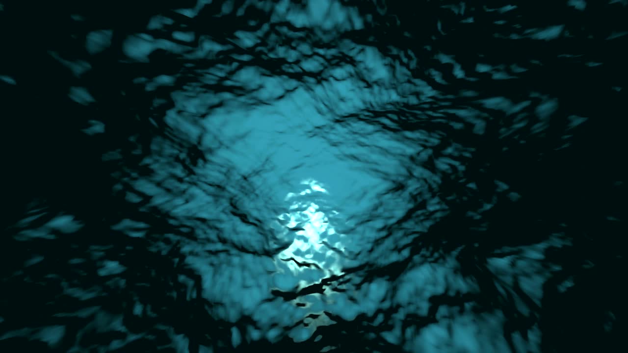 animación en bucle de 4k de olas de agua desde debajo del agua con plancton flotante. rayos de luz brillando a través. fondo. mar profundo azul oscuro. fondo gráfico de movimiento y animación.