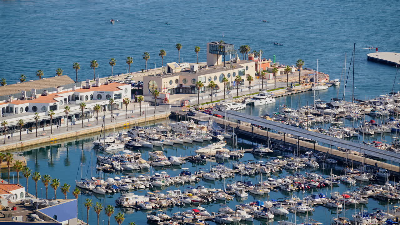 Aerial view of boats docked in the Alicante marina in the daylight in Spain