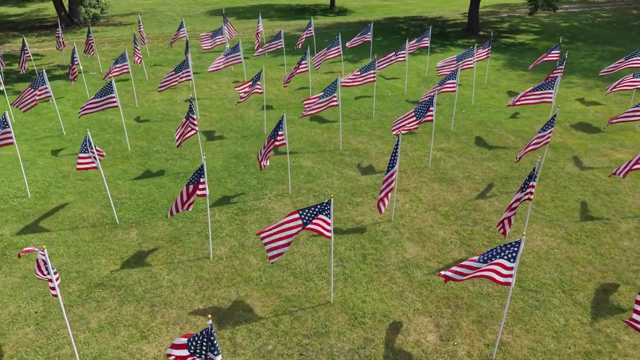 Epic field full of American flags during Independence and Memorial Day, a beautiful colorful field in Massachusetts, USA