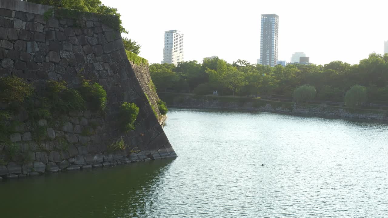 The Inner Moat And Stone Wall Around Osaka Castle In Chūō-ku, Osaka, Japan. Wide Shot