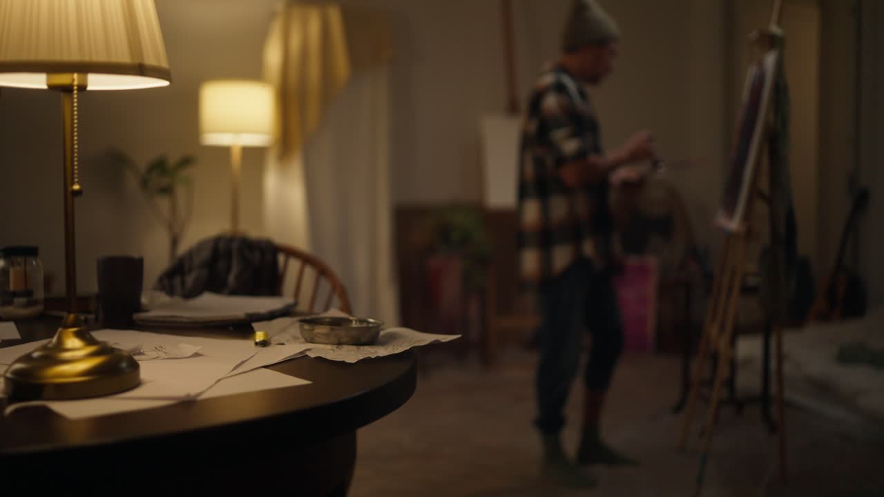 Artist Painting in a Night Studio